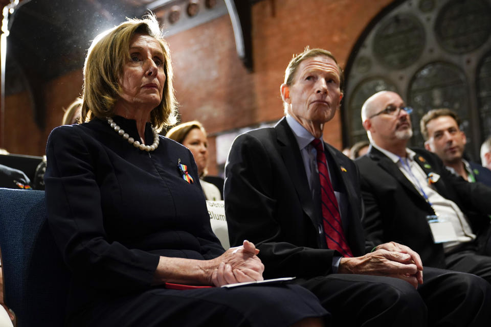 House Speaker Nancy Pelosi of Calif., listens before President Joe Biden speaks during an event in Washington, Wednesday, Dec. 7, 2022, with survivors and families impacted by gun violence for the 10th Annual National Vigil for All Victims of Gun Violence. (AP Photo/Susan Walsh)