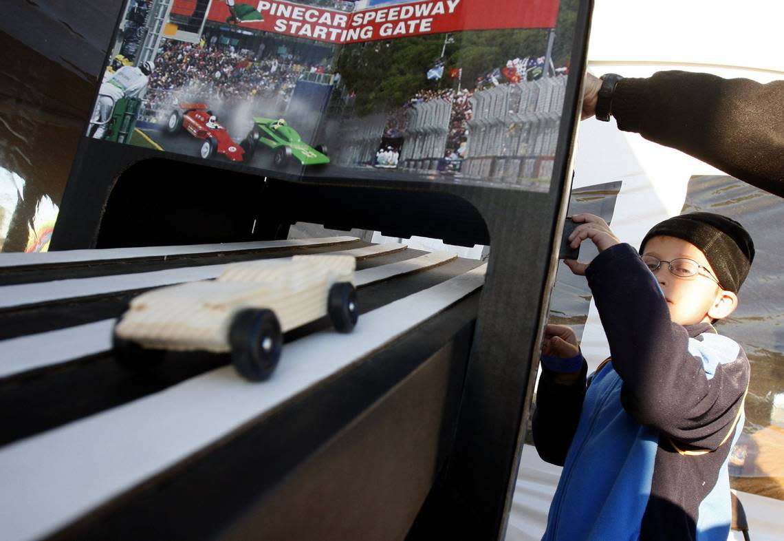 Nov. 15, 2008: Ryan Seltzer, 8, of Cub Scout Troop 937 of Southlake, tests his pinewood derby car at Council Camporee at Texas Motor Speedway. RICHARD W. RODRIGUEZ/Special to the Star-Rodriguez