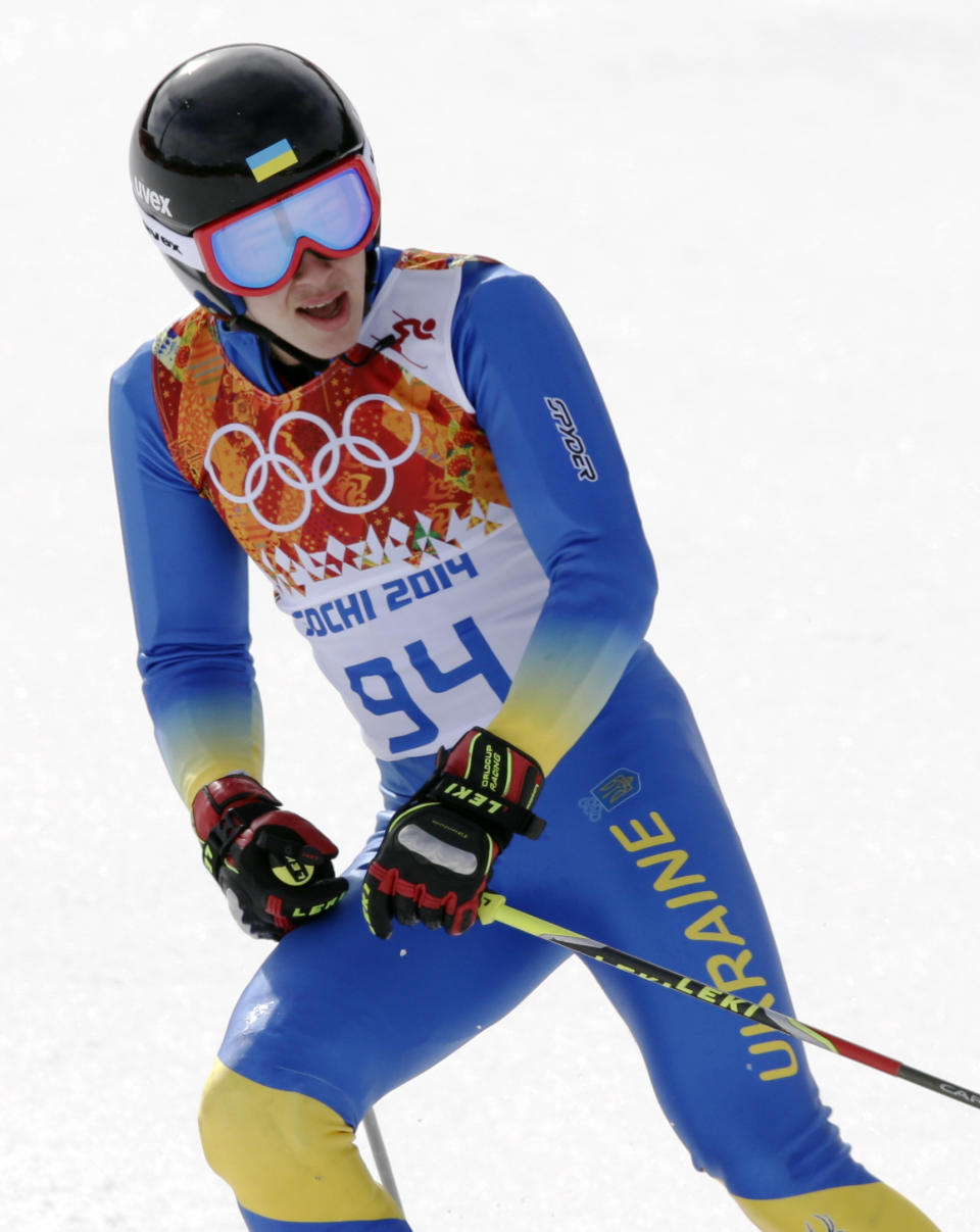 Ukraine's Dmytro Mytsak finishes the first run of the men's giant slalom at the Sochi 2014 Winter Olympics, Wednesday, Feb. 19, 2014, in Krasnaya Polyana, Russia. (AP Photo/Gero Breloer)