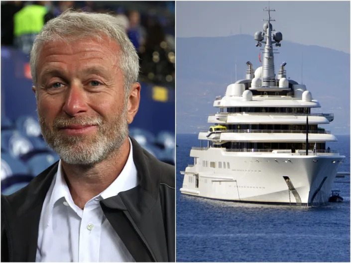 Roman Abramovich, owner of Chelsea FC, next to his superyacht called Eclipse