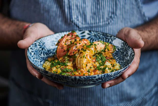 <p>Felipe Cuevas/Courtesy of Thesis Hotel</p> Shrimp and grits from Mamey