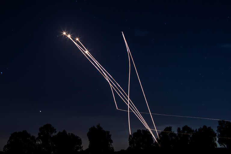 13 May 2021, Israel, Sderot: Israeli Iron Dome missiles intercept rockets fired from the Gaza Strip towards Israel, amid the escalating flare-up of Israeli-Palestinian violence. Photo: Ilia Yefimovich/dpa