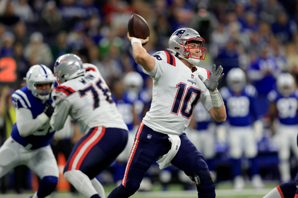 New England Patriots quarterback Mac Jones throws during the first half of an NFL football game against the Indianapolis Colts Saturday, Dec. 18, 2021, in Indianapolis. (AP Photo/Aaron Doster)