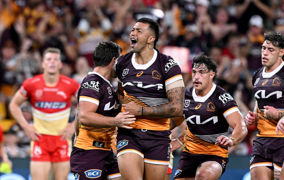 BRISBANE, AUSTRALIA - APRIL 12: Xavier Willison of the Broncos celebrates after scoring a try during the round six NRL match between the Brisbane Broncos and Dolphins at Suncorp Stadium, on April 12, 2024, in Brisbane, Australia. (Photo by Bradley Kanaris/Getty Images)