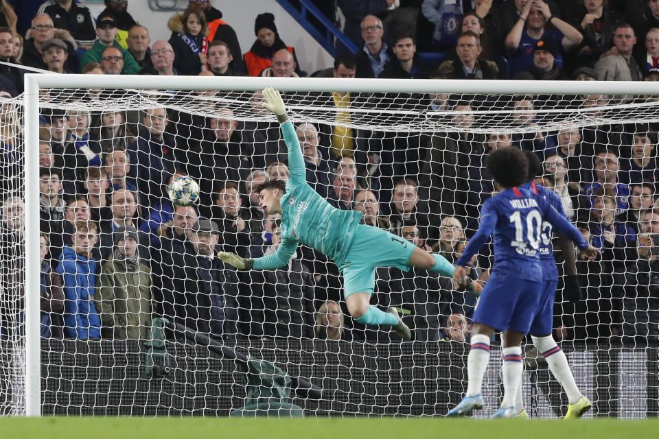 Chelsea's goalkeeper Kepa Arrizabalaga scores an own goal during the group H Champions League soccer match between Chelsea and Ajax at Stamford Bridge in London, Tuesday, Nov. 5, 2019. (AP Photo/Frank Augstein)