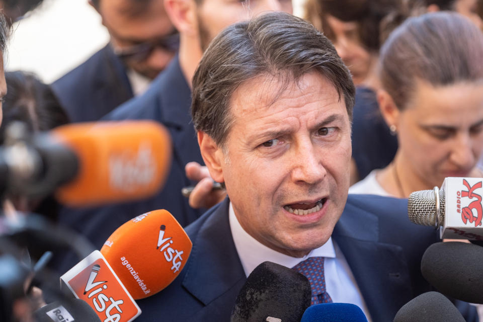 FILE - Former Italian Premier and 5-Star Movement Leader Giuseppe Conte talks to journalists outside Chigi Palace government offices in Rome, Wednesday, July 6, 2022, after meeting with Italian premier Mario Draghi. Pleas were piling up in Italy on Sunday, July 17, 2022 aimed at persuading Draghi to stay in office instead of resigning as he tried to do last week after being betrayed by a major coalition partner. (Mauro Scrobogna/LaPresse via AP, File)