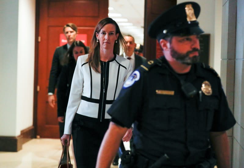 Jennifer Williams departs after testifying at House impeachment inquiry on Capitol Hill in Washington