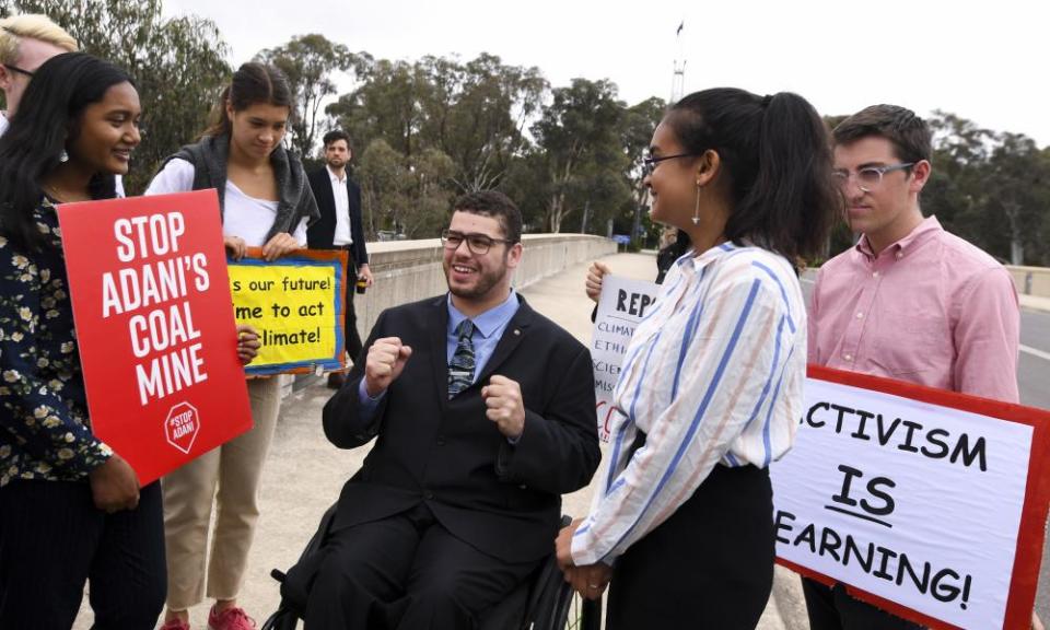 Greens senator Jordan Steele-John speaks with climate change protesters in Canberra in 2018