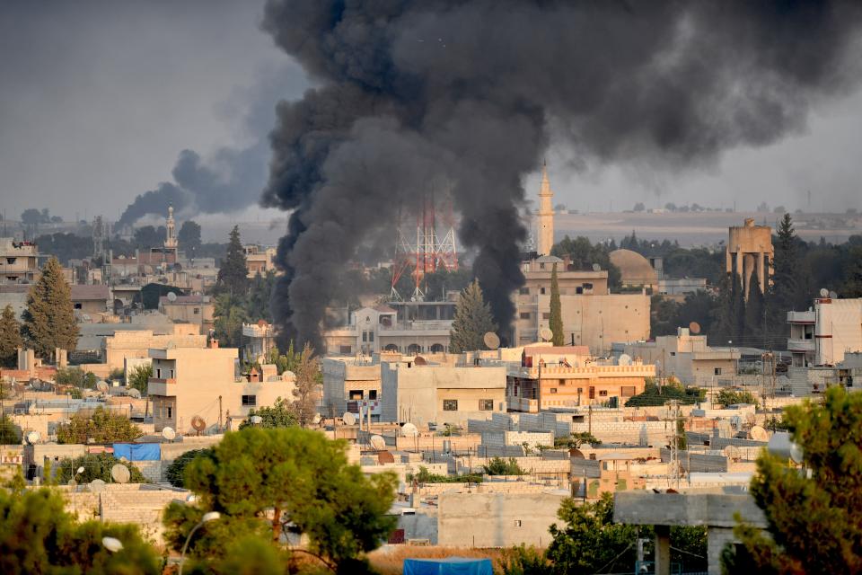 A photo taken from Turkey's Sanliurfa province, on Oct. 9, 2019 shows smoke rises at the site of Ras al-Ayn city of Syria as Turkish troops along with the Syrian National Army begin Operation Peace Spring in northern Syria against PKK/YPG, Daesh terrorists. (Photo: Kerem Kocalar/Anadolu Agency via Getty Images)