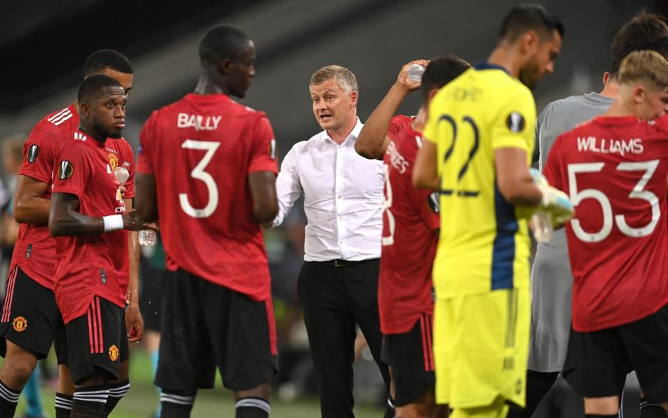 Manchester United coach Ole Gunnar SolskjÃ¦r (C) talks to players during a drinking break in the UEFA Europa League quarter final soccer match between Manchester United and FC Copenhagen in Cologne, Germany, 10 August 2020 Manchester United vs FC Copenhagen, Cologne, Germany. - Sascha Steinbach/POOL/EPA-EFE/Shutterstock