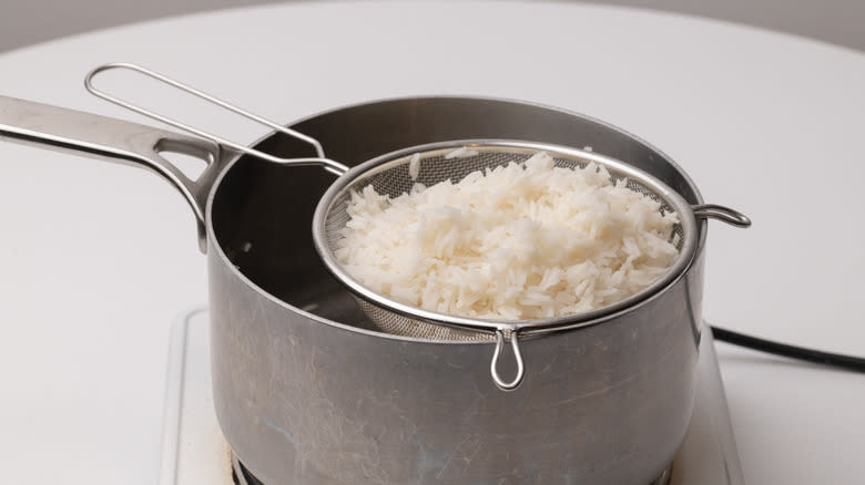 rice draining in a colander