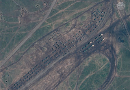 A satellite image of armored vehicles staging during the Russian military exercise known as Vostok 2018, conducted at the Tsugol training area in eastern Russia, September 13, 2018. Satellite image ©2018 DigitalGlobe, a Maxar company/Handout via REUTERS