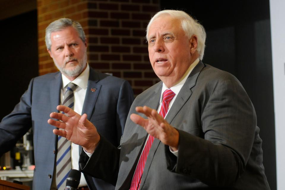 Jerry Falwell Jr., President of Liberty University, and Jim Justice, Governor of West Virginia, answer questions at a press conference at Blue Ridge Community and Technical College on Tuesday, Jan. 28, 2020 in Martinsburg, W.Va.