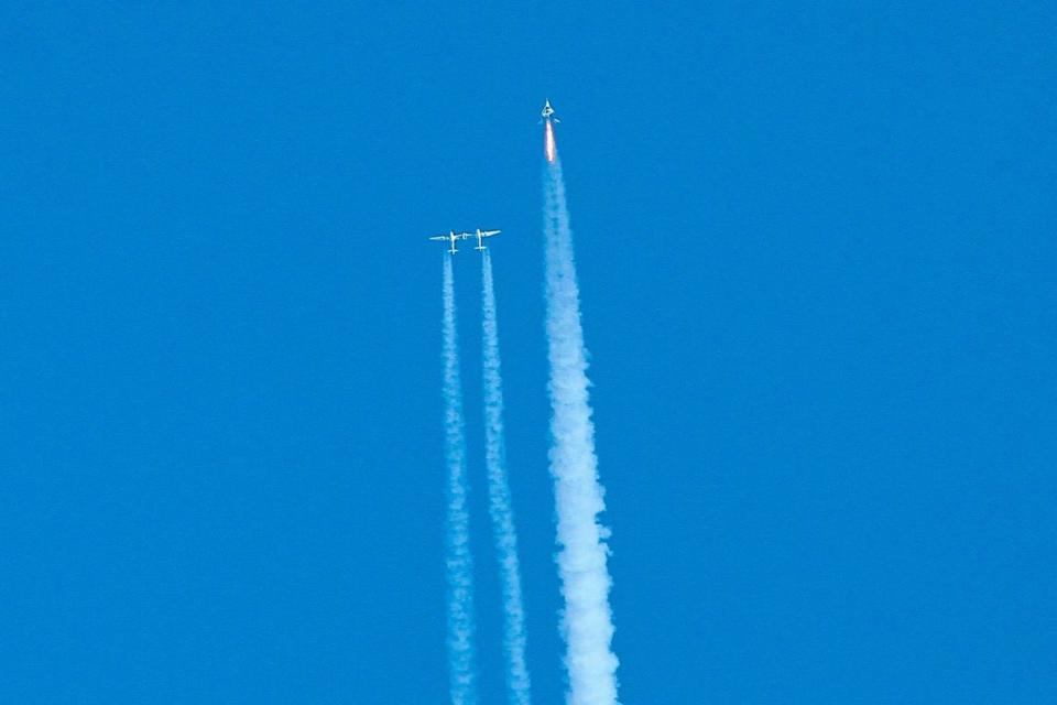 Virgin Galactic fires its rocket motors to reach the edge of space (AP)