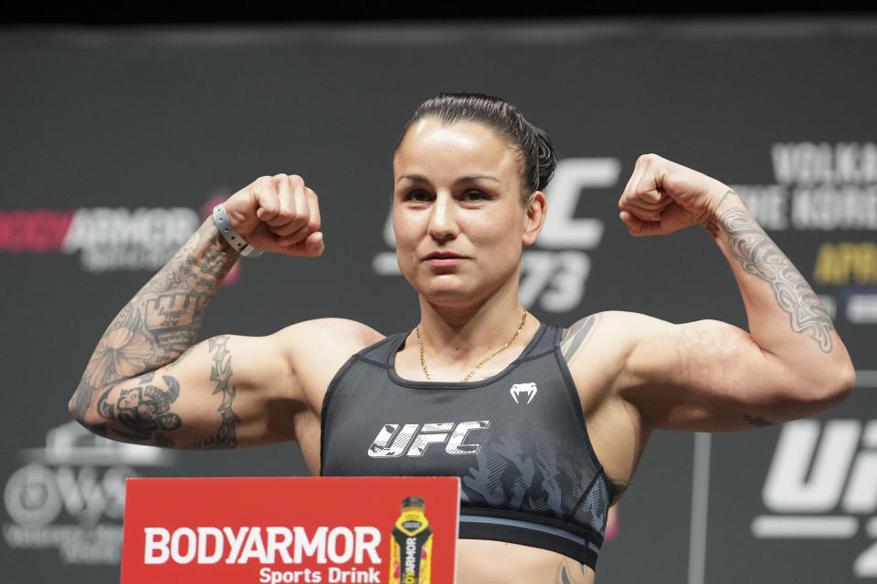 Apr 8, 2022; Jacksonville, FL, USA; Raquel Pennington on the scale during weigh ins for UFC 273 at VyStar Veterans Memorial Stadium. Mandatory Credit: David Yeazell-USA TODAY Sports
