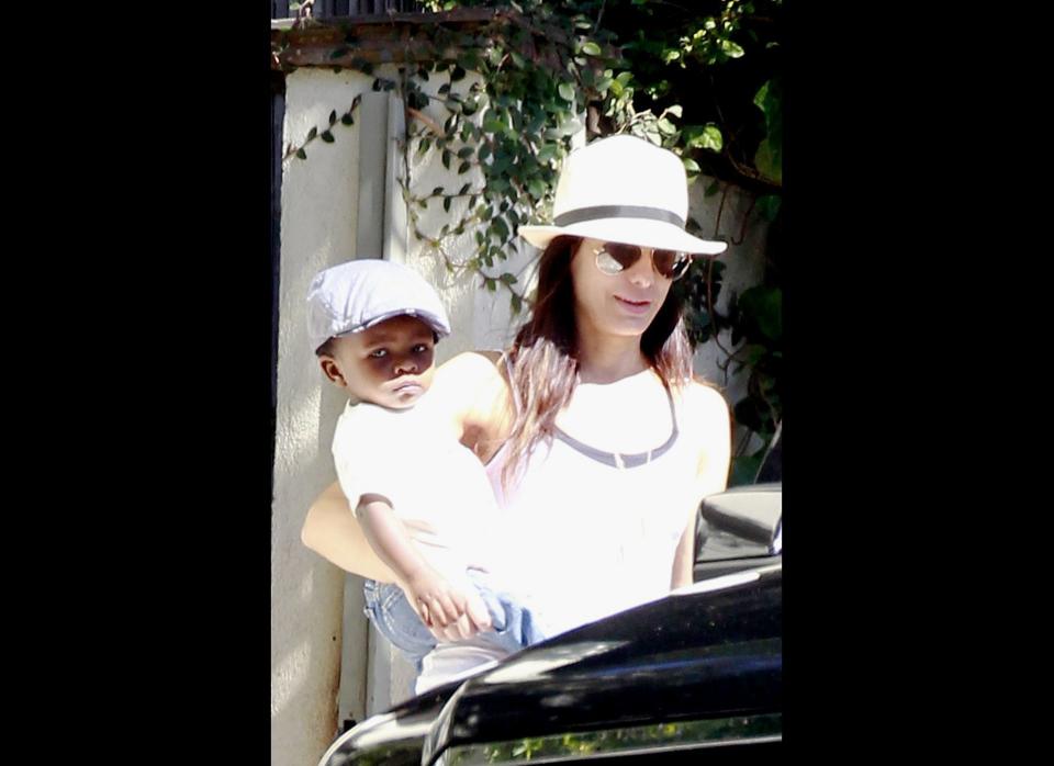 Sandra Bullock steps out with her little guy Louis for a day out in Los Angeles, California. 