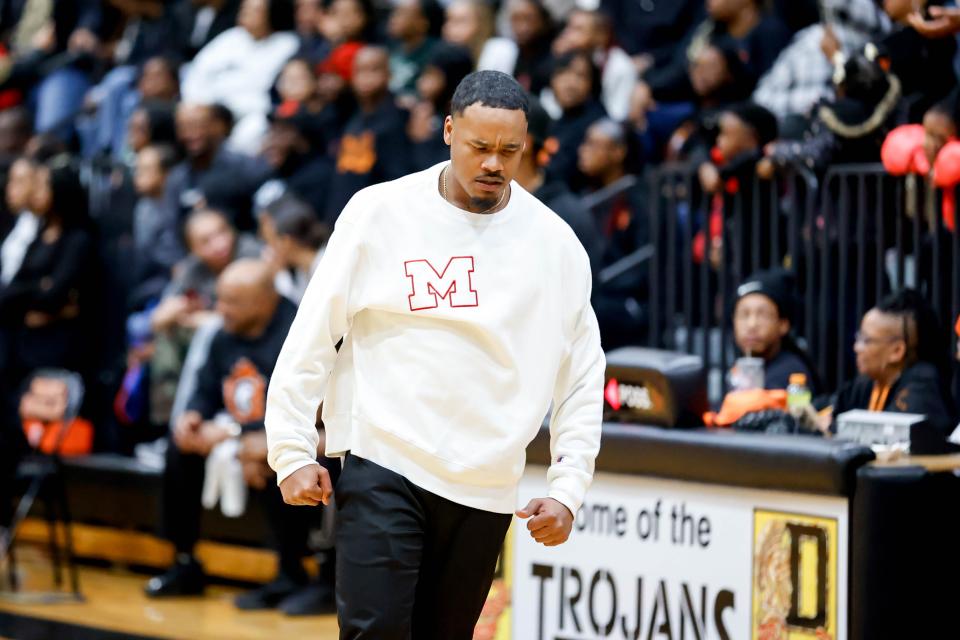 Millwood head coach Dorrian Williams stands on the sidelines during a high school basketball game between Douglass and Millwood in Oklahoma City, on Saturday, Jan. 13, 2024.