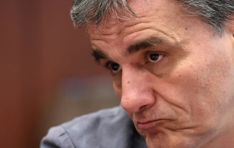 Greece's Finance Minister Euclid Tsakalotos looks on during a Eurogroup finance ministers meeting on May 22, 2017