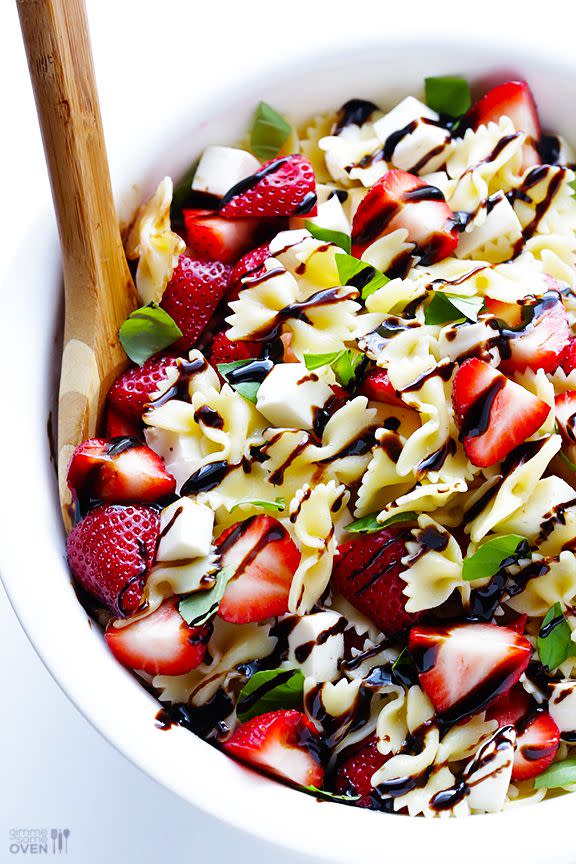 <p>Replace tomatoes with strawberries for a warm-weather twist on pasta salad. Drizzle a thick balsamic glaze over the top of this 5-ingredient dish and you're ready to serve. </p><p><strong>Get the recipe at <a rel="nofollow noopener" href="http://www.gimmesomeoven.com/5-ingredient-strawberry-caprese-pasta-salad/" target="_blank" data-ylk="slk:Gimme Some Oven;elm:context_link;itc:0;sec:content-canvas" class="link ">Gimme Some Oven</a>. </strong></p>