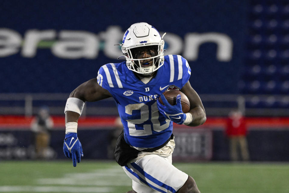 Duke running back Jaquez Moore (20) runs the ball during the second half of the Military Bowl NCAA college football game against UCF, Wednesday, Dec. 28, 2022, in Annapolis, Md. (AP Photo/Terrance Williams)