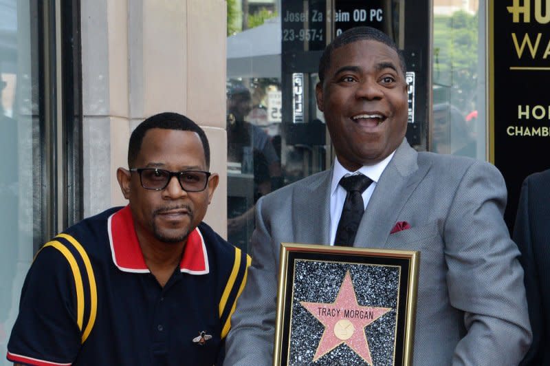 Martin Lawrence (L) and Tracy Morgan attend Morgan's Hollywood Walk of Fame ceremony in 2018. File Photo by Jim Ruymen/UPI