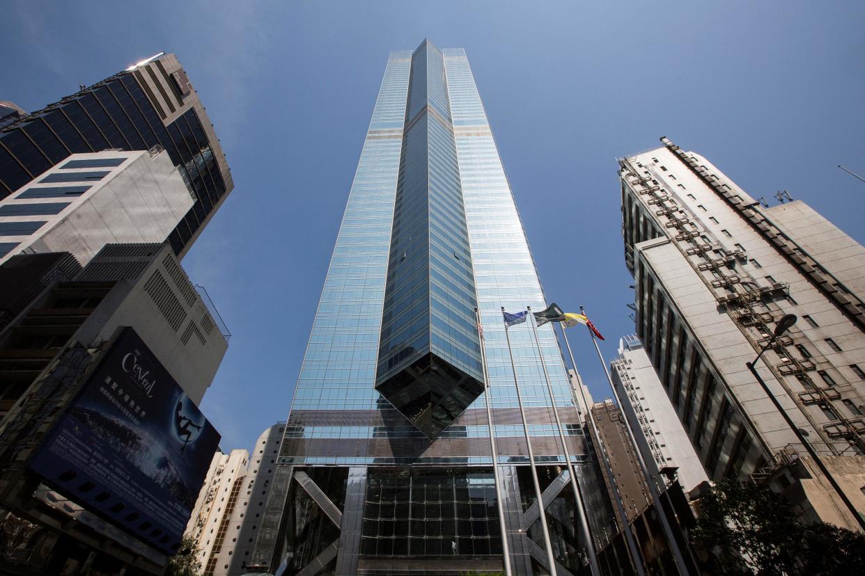 This picture taken on October 27, 2017 shows a general view of The Center (C) office building in Hong Kong. 
Chinese investors' penchant for Hong Kong real estate is well-known but as they take aim at ownership of the city's most prestigious buildings and office floors, mainland cash is driving one of the world's priciest markets to break new records. / AFP PHOTO / Isaac LAWRENCE / TO GO WITH Hong Kong-China-property-economy-developer-landmark, FOCUS by Elaine YU        (Photo credit should read ISAAC LAWRENCE/AFP via Getty Images)