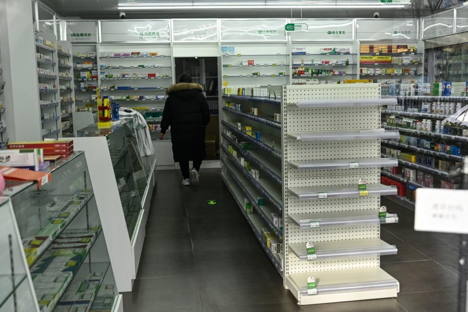 Near empty shelves of medicine are seen at a pharmacy amid the Covid-19 pandemic in Beijing on December 17, 2022. (Photo by Jade GAO / AFP) (Photo by JADE GAO/AFP via Getty Images)