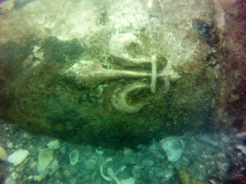 The French fleur-de-lis symbol engraved on a 16th-century bronze cannon discovered in a shipwreck off the coast of Cape Canaveral in Florida.