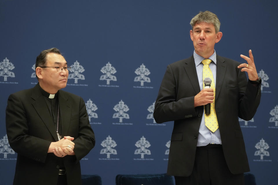 The new Caritas Internationalis President, Tokyo Archbishop Tarcisio Isao Kikuchi, left, and new Caritas Internationalis secretary general Alistair Dutton meet the journalists at the Vatican, Tuesday, May 16, 2023. (AP Photo/Gregorio Borgia)