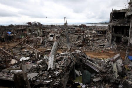 Damaged houses and buildings are seen in Marawi city, Philippines October 25, 2017. REUTERS/Romeo Ranoco