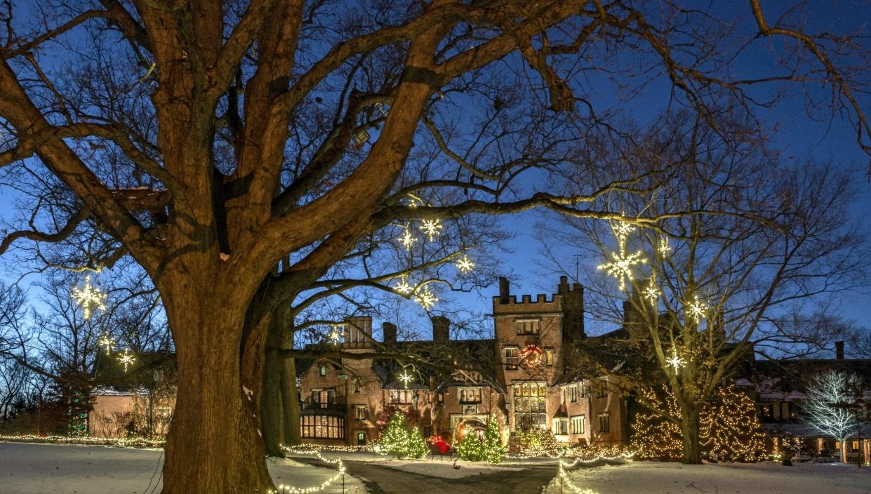 Stan Hywet Hall is aglow with lights for Deck the Hall over the holidays.