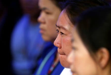 A family member reacts during the visit of Thailand's Prime Minister Prayut Chan-o-cha (not pictured) near the Tham Luang cave complex, as an ongoing search for members of an under-16 soccer team and their coach continues, in the northern province of Chiang Rai, Thailand, June 29, 2018. REUTERS/Soe Zeya Tun