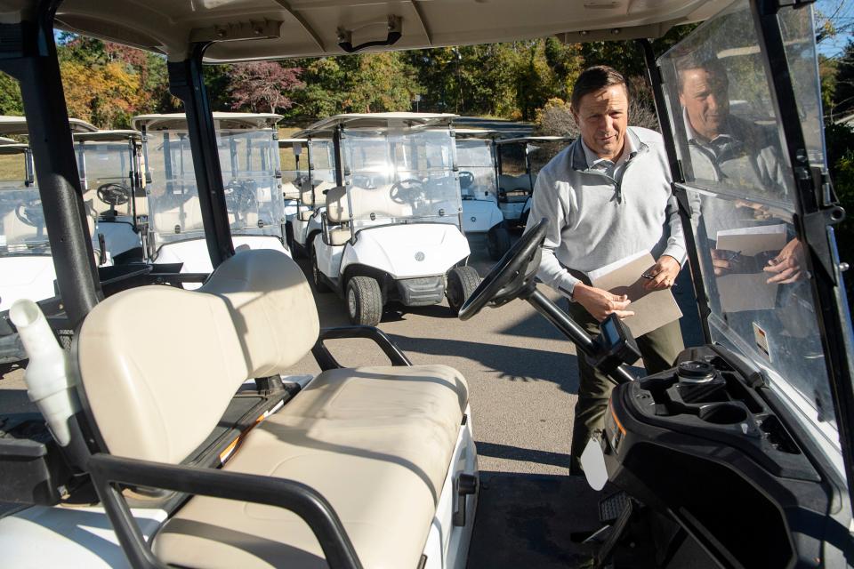 Mike Bennett, one of the operators with Commonwealth Golf Partners, among the new fleet of golf carts at Asheville Municipal Golf Course, October 18, 2023.