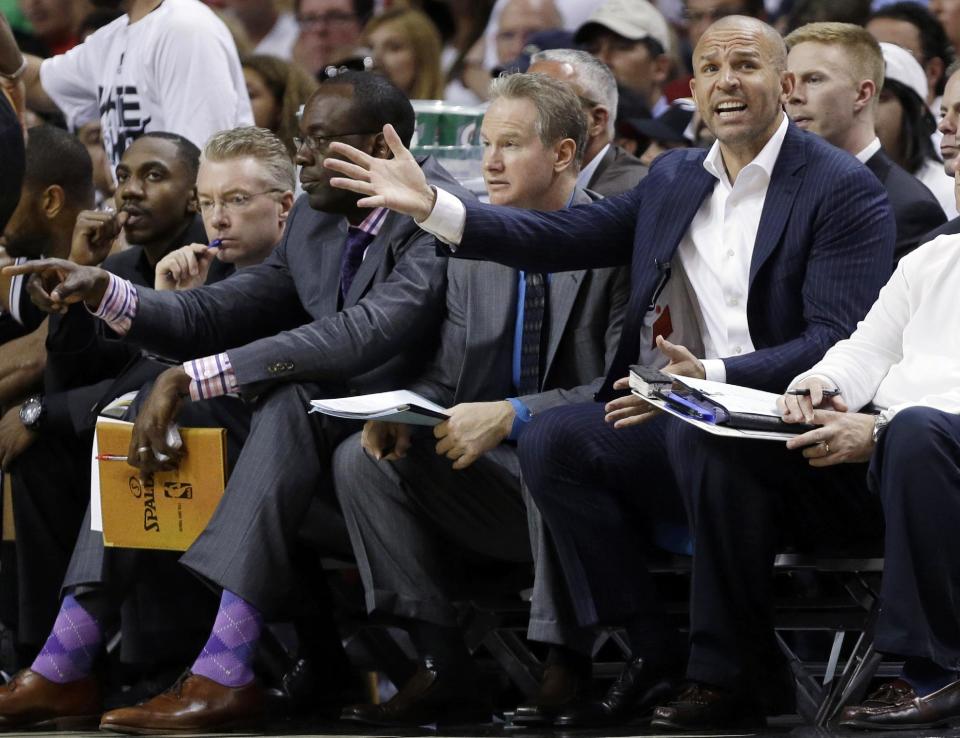 Brooklyn Nets head coach Jason Kidd, second from right, gestures in the first half of Game 1 in an NBA basketball Eastern Conference semifinal playoff series against the Miami Heat, Tuesday, May 6, 2014, in Miami. (AP Photo/Lynne Sladky)