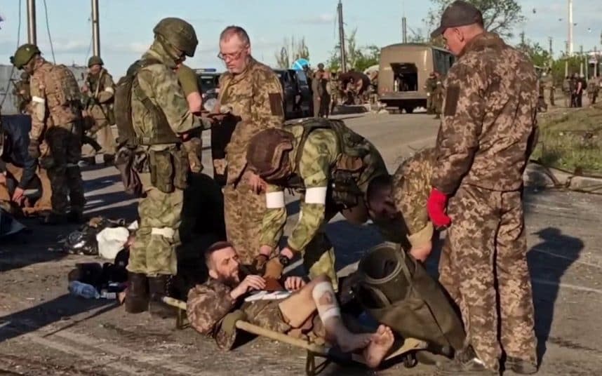 Ukrainian soldiers searched by pro-Russian military after leaving the Azovstal steel plant - AFP
