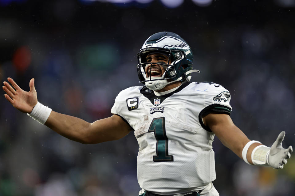 Philadelphia Eagles quarterback Jalen Hurts (1) reacts after a touchdown against the New York Giants during an NFL football game Sunday, Dec. 11, 2022, in East Rutherford, N.J. (AP Photo/Adam Hunger)