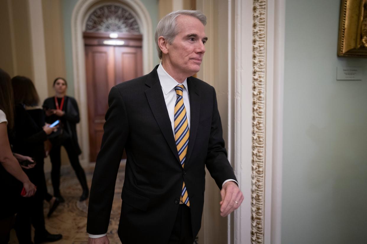 Sen. Rob Portman, R-Ohio, arrives as the impeachment trial of President Donald Trump on charges of abuse of power and obstruction of Congress resumes in Washington. Pressure is increasing on a Trump administration official to authorize a formal transition process for President-elect Joe Biden. Portman of Ohio on Monday, Nov. 23, called for the head of the General Services Administration to release money and staffing needed for the transition. (AP Photo/J. Scott Applewhite, File) (AP)