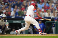 Philadelphia Phillies' Kyle Schwarber is hit by a pitch from Toronto Blue Jays' Jose Berrios during the fourth inning of a baseball game, Tuesday, May 7, 2024, in Philadelphia. (AP Photo/Matt Slocum)