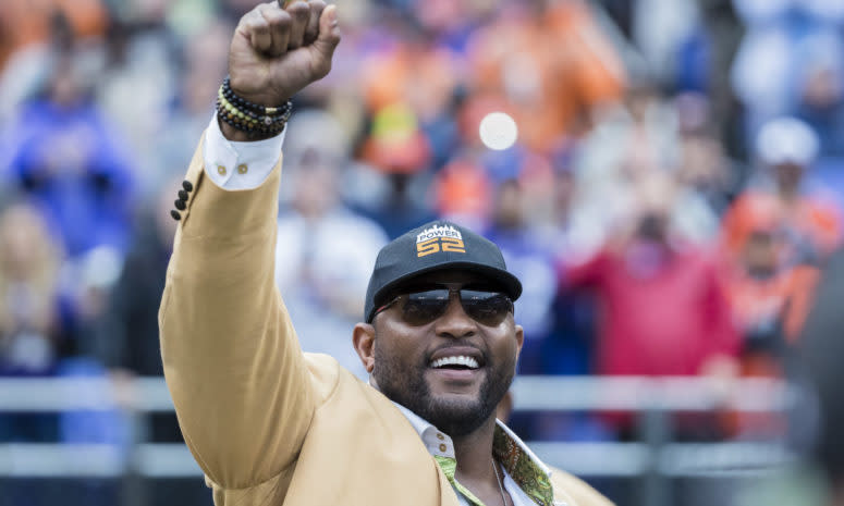 Hall of Fame linebacker Ray Lewis razing his fist.