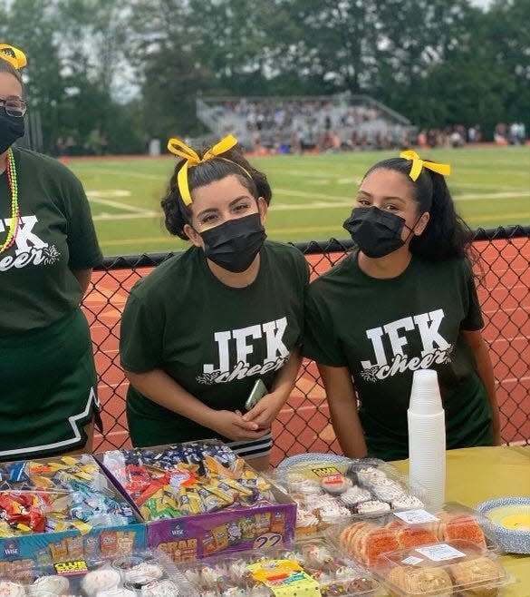 J.F. Kennedy cheerleader Caitlin Ticas (left) will cheer in the Marisa Rose Bowl