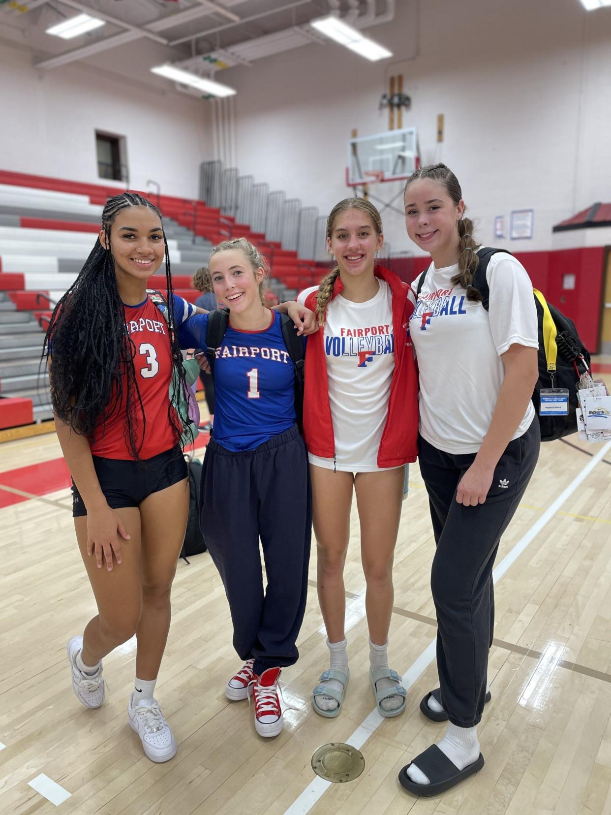 Fairport girls volleyball players Avery Harris, Peyton Snyder, Kiera Cornman and Meghan Clifford. They won 3-1 at Penfield on Sept. 12, 2023.