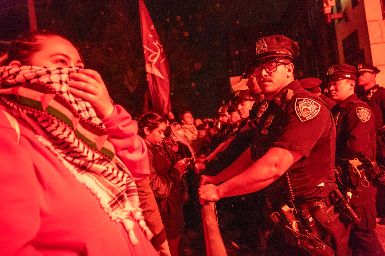 Pro-Palestinian supporters confront police during demonstrations at City College in New York City.