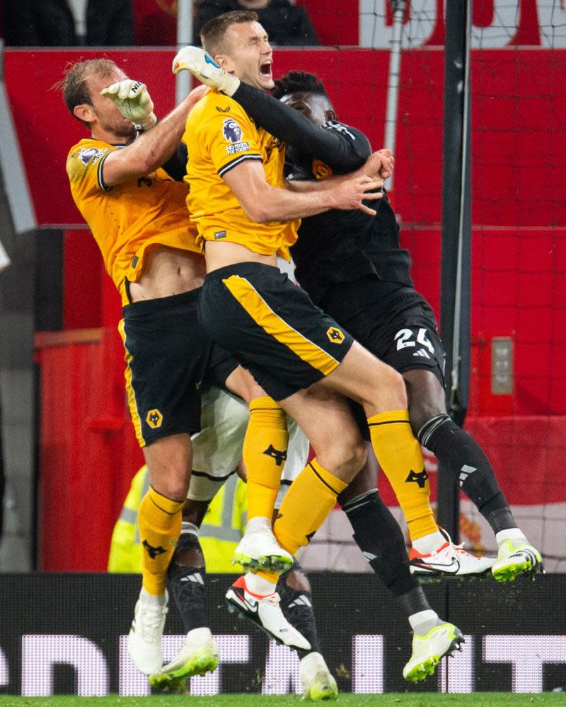 Manchester United’s Andre Onana (right) clatters into Wolverhampton Wanderers Sasa Kalajdzic but no penalty is given.