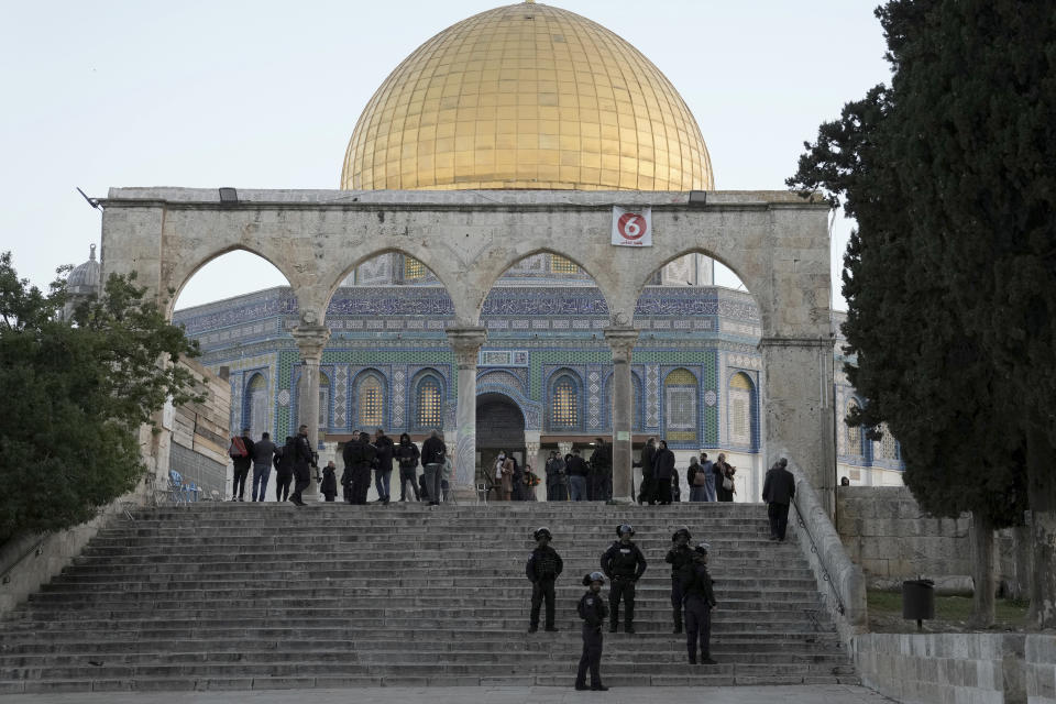 Israeli police are deployed at the Dome of the Rock Mosque in the Al-Aqsa Mosque compound following a raid at the site during the Muslim Holy month of Ramadan in the Old City of Jerusalem, Wednesday, April 5, 2023. Palestinian media reported police attacked Palestinian worshippers, raising fears of wider tension as Islamic and Jewish holidays overlap.(AP Photo/Mahmoud Illean)