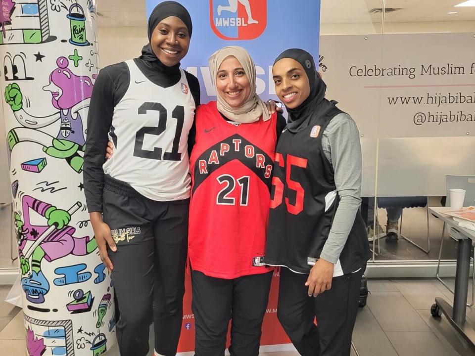 From left to right: Batouly Camara, Shireen Ahmed and Bilqis Abdul-Qaadir at a basketball tournament in Toronto  co-organized by Hijabi Ballers and the Muslim Women's Summer Basketball League.  (Shireen Ahmed/CBC Sports - image credit)