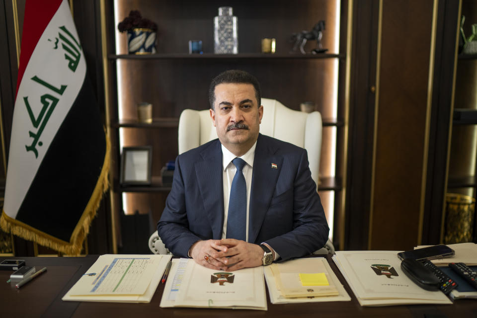 Prime Minister Mohammed Shia al-Sudani sits for a portrait in his office in Baghdad, Iraq, Wednesday, March 1, 2023. Unlike other Shiite politicians who fled Iraq during the Saddam Hussein era, he never left Iraq, even after his father and five brothers were executed by the regime. (AP Photo/Jerome Delay)