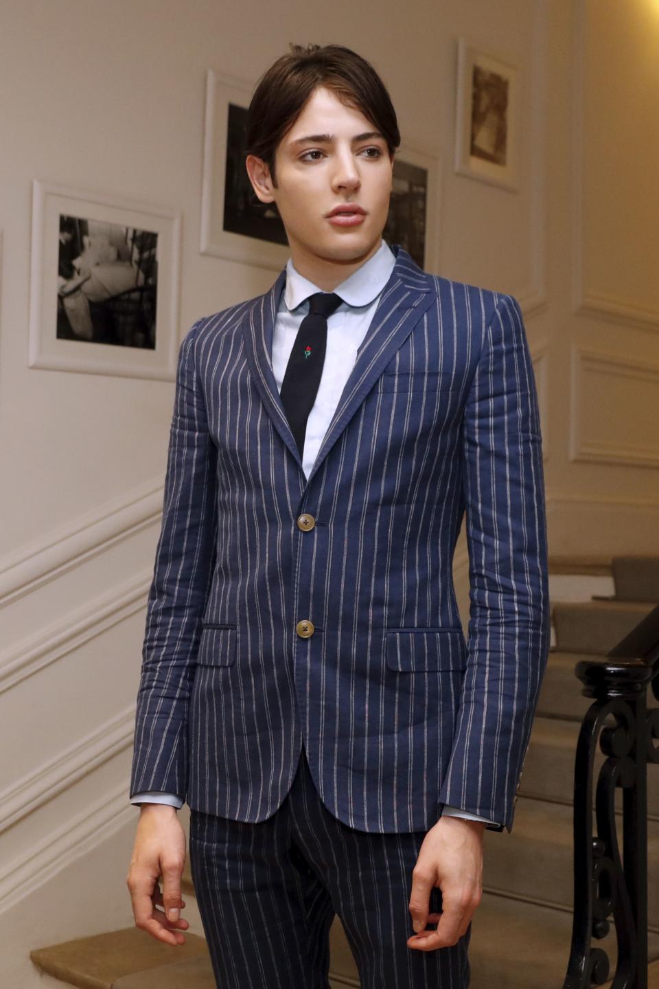 Harry Brant poses before Christian Dior 2016-2017 fall/winter Haute Couture collection fashion show on July 4, 2016 in Paris. (AFP / PATRICK KOVARIK via Getty Images)