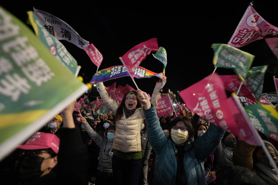 Supporters of Taiwan Democratic Progressive Party (DPP) presidential candidate cheer during a rally in Taipei, Taiwan on Thursday, Jan. 11, 2024 ahead of the presidential election on Saturday. (AP Photo/Ng Han Guan)
