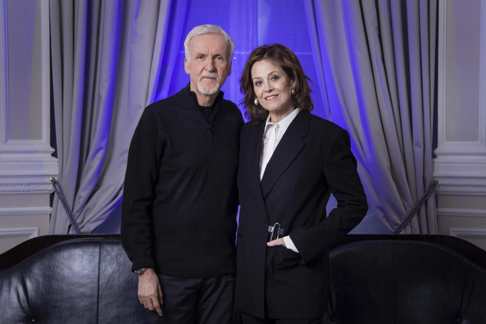 Director James Cameron, left and Sigourney Weaver pose for portrait photographs to promote the film "Avatar: The Way of Water" in London, Sunday, Dec. 4, 2022. (Photo by Vianney Le Caer/Invision/AP)