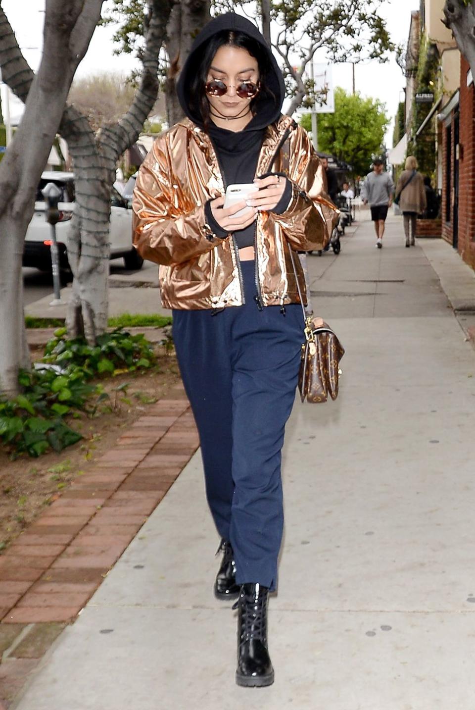 <p><strong>Who:</strong> Vanessa Hudgens</p><p><strong>Affordable Fashion Find: ASOS </strong>jacket, $68, <a rel="nofollow noopener" href="http://us.asos.com/asos/asos-cropped-metallic-anorak/prd/7202642?iid=7202642&clr=Rosegold&SearchQuery=asos%20cropped%20metallic%20ca&pgesize=11&pge=0&totalstyles=11&gridsize=3&gridrow=1&gridcolumn=3&setPrefSite=true&r=1&mk=na" target="_blank" data-ylk="slk:asos.com;elm:context_link;itc:0;sec:content-canvas" class="link ">asos.com</a>.</p><p><strong>Why We Love It: </strong>The actress's eye-catching metallic jacket added the perfect edge to her sweats. </p>